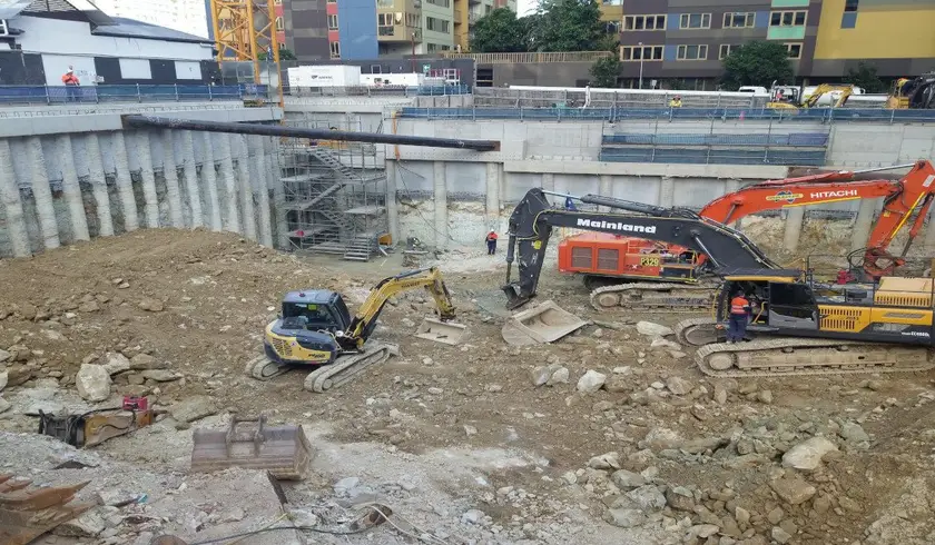 Excavators working in the Jubilee Place basement excavation