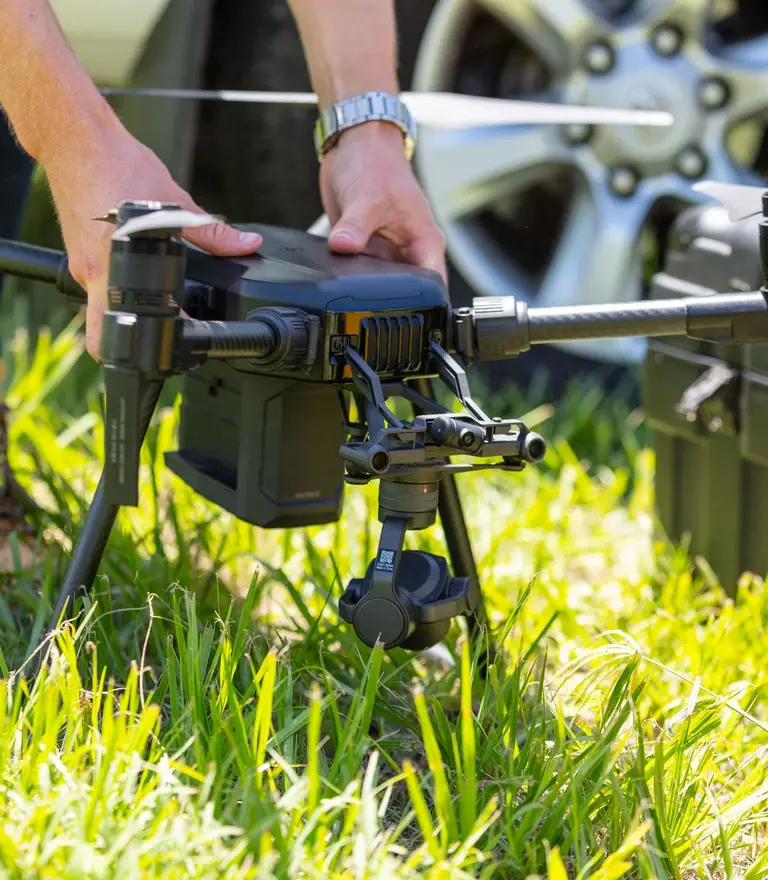 Land Solution Australia surveyor preparing a survey drone for an aerial mapping flight