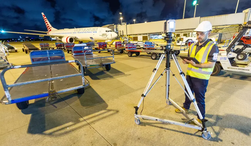 Land Solution surveyor on site at Brisbane Airport Terminal 