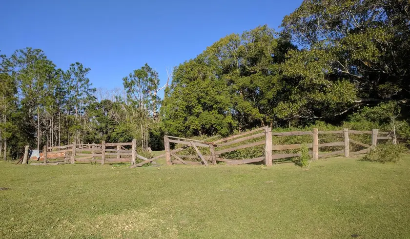 Old timber post-and-rail stockyard fence on the heritage park site