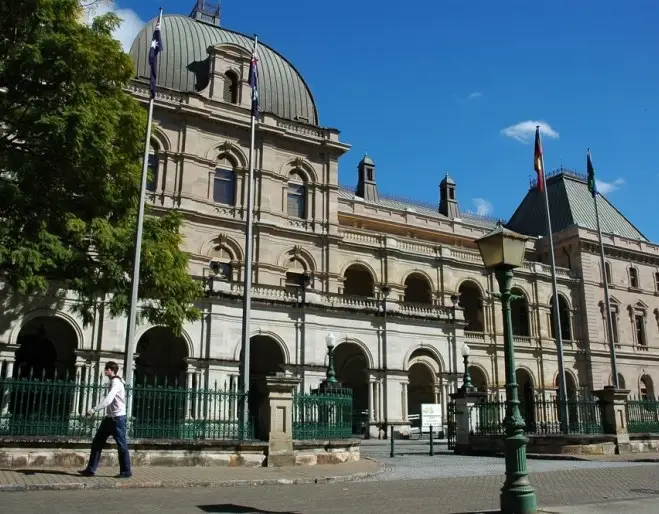 The sandstone facade and domed roof of Old Parliament House, Brisbane