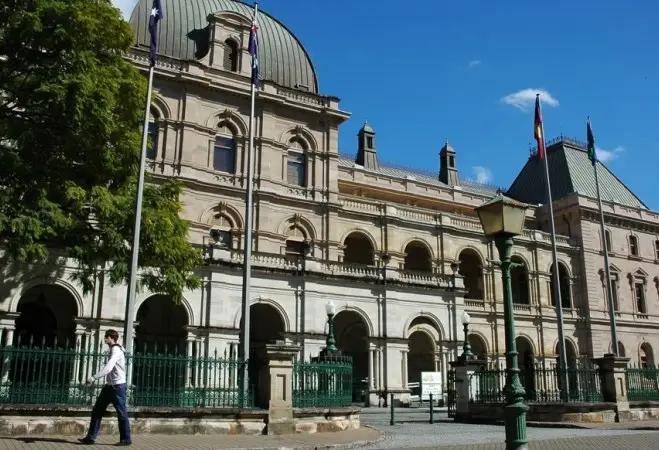 The sandstone facade and domed roof of Old Parliament House, Brisbane