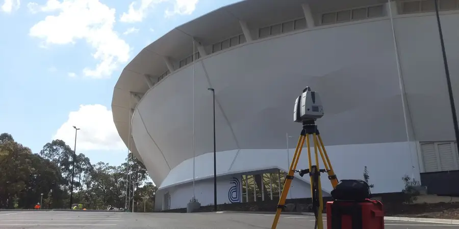 Laser scanner set up in front of the completed Queensland State Velodrome in Chandler