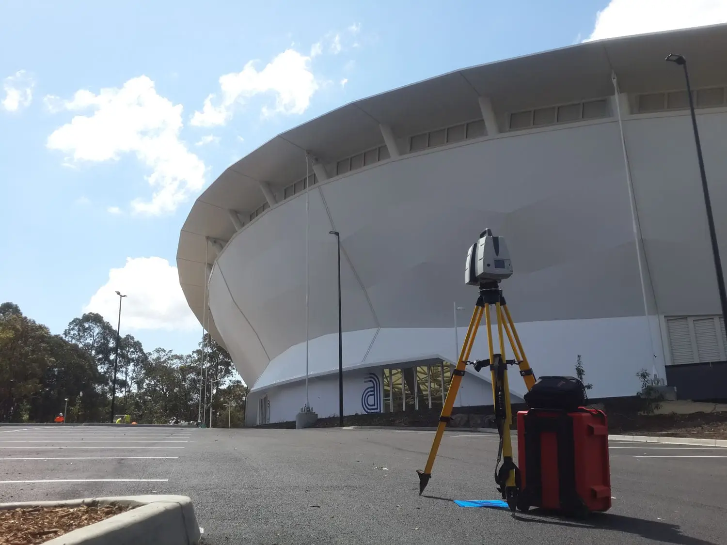 Laser scanner set up in front of the completed Queensland State Velodrome in Chandler